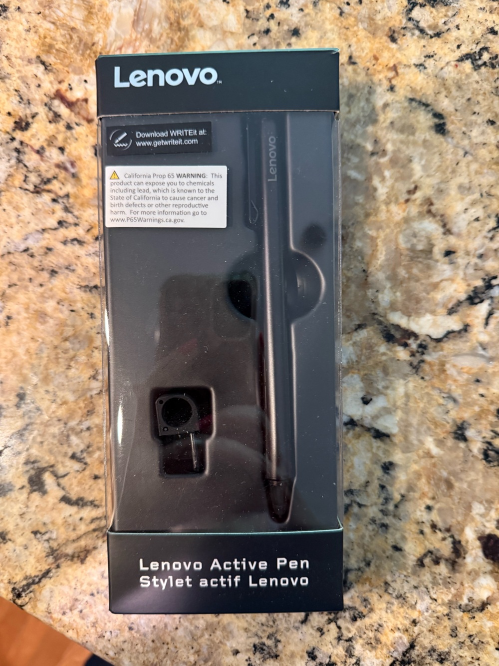 Lenovo pen accessory in black and teal